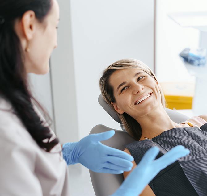 Dentist discussing treatment options for gum disease